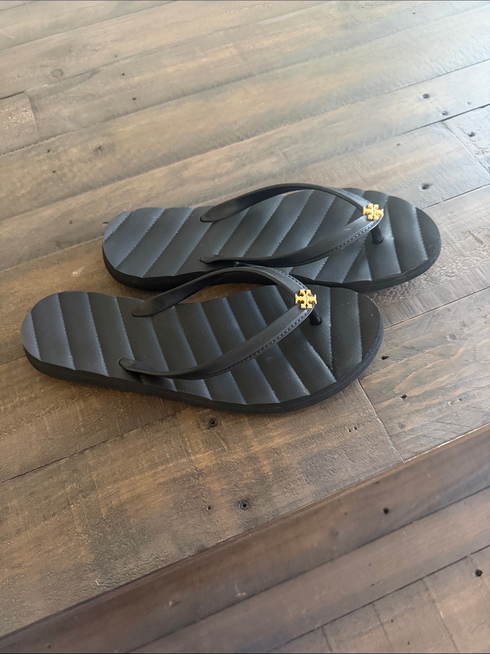 Tory Burch Black Quilted Flip Flop Sandals with Gold Logo